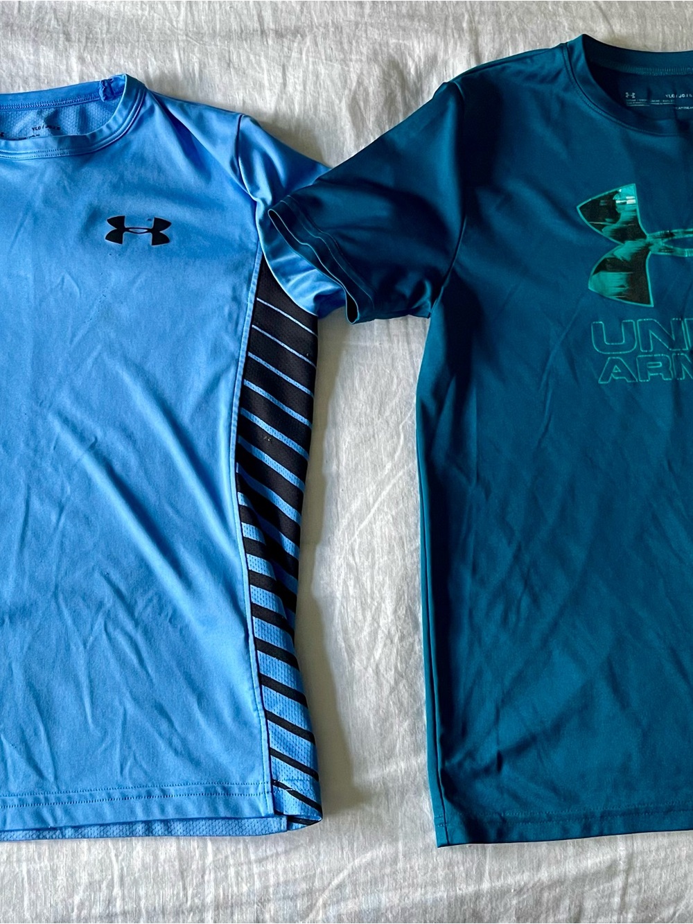 Under Armour Boys' Tees in Light Blue and Teal. Red Nike short sleeve